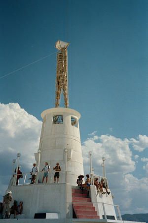 The Man standing on a lighthouse