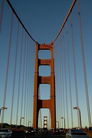 Driving over the Golden Gate at sun set